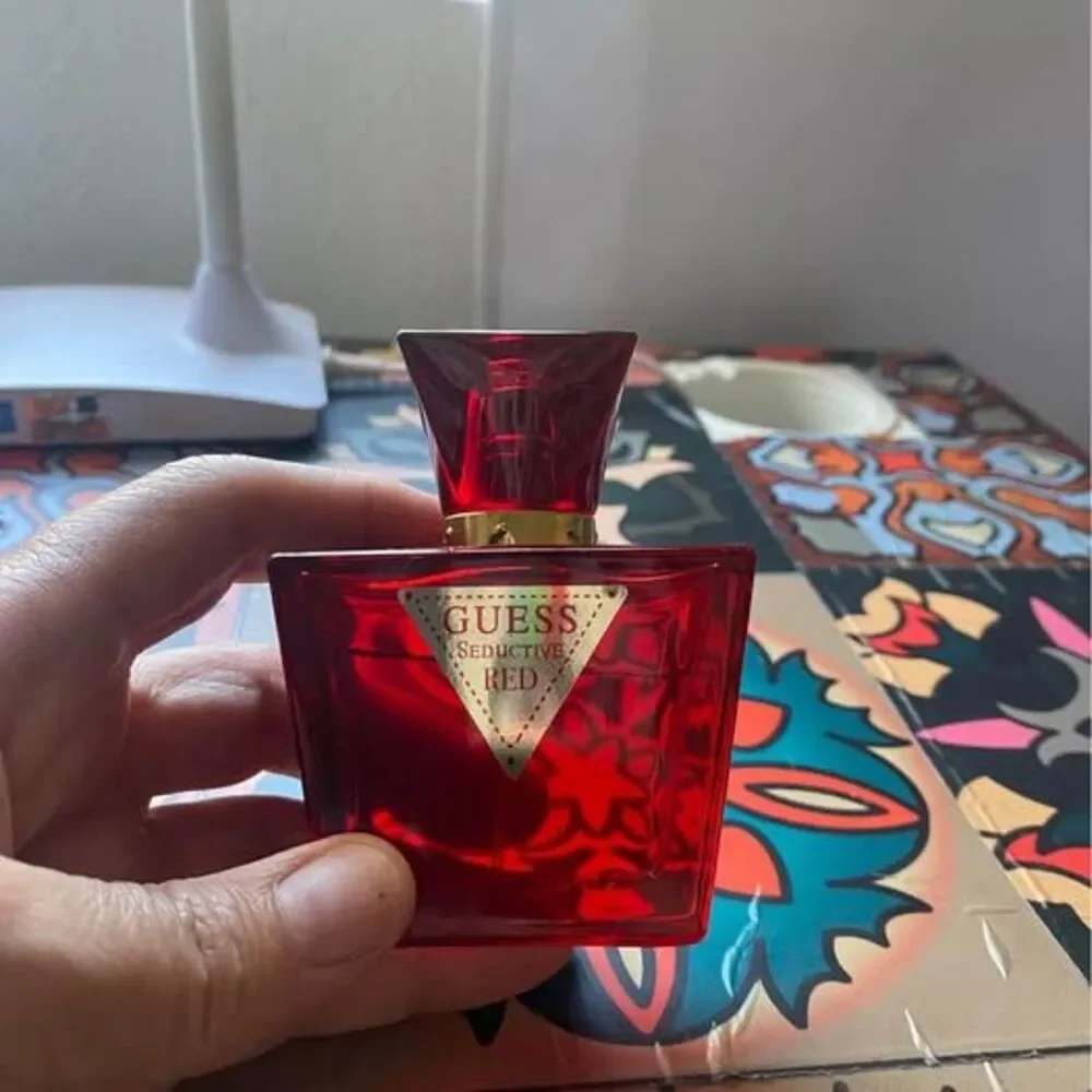 2.5 ounce bottle of Guess Seductive Red EDP